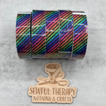Load image into Gallery viewer, 1&quot; Stick &#39;n Sew™ Self-Adhesive Binding Tape in Diagonal Rainbow Grunge Stripes (10 Yard Roll)
